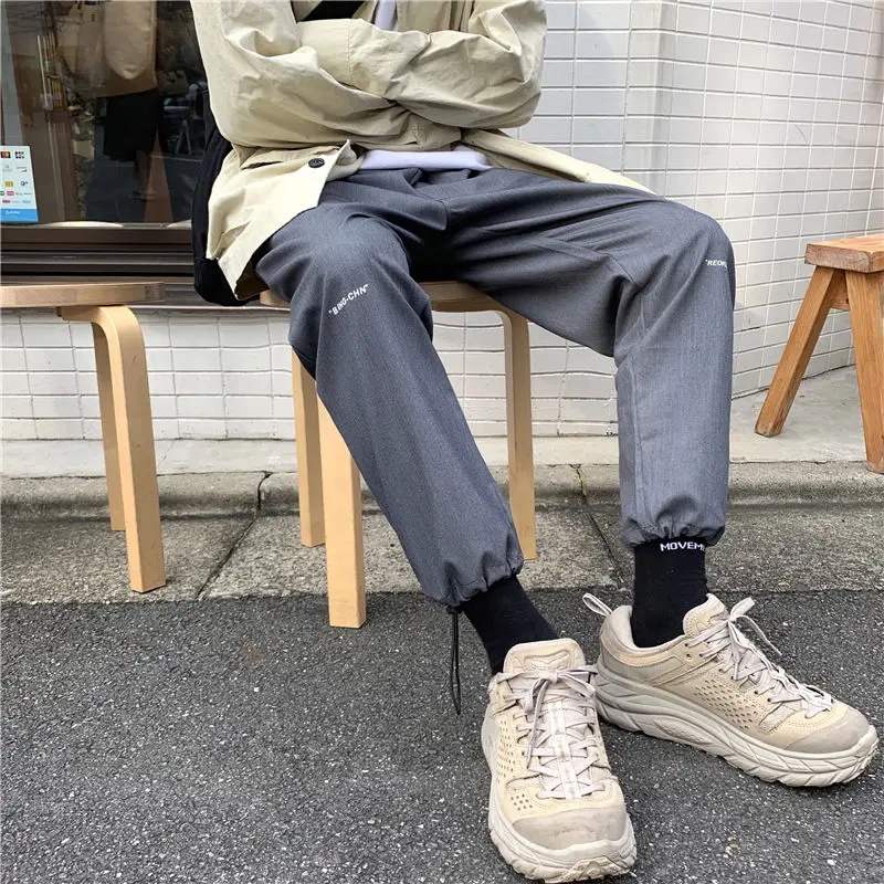 

Men's casual pants 2020 spring and summer new loose printed bouquet legs casual pants young personality fashion men's clothing