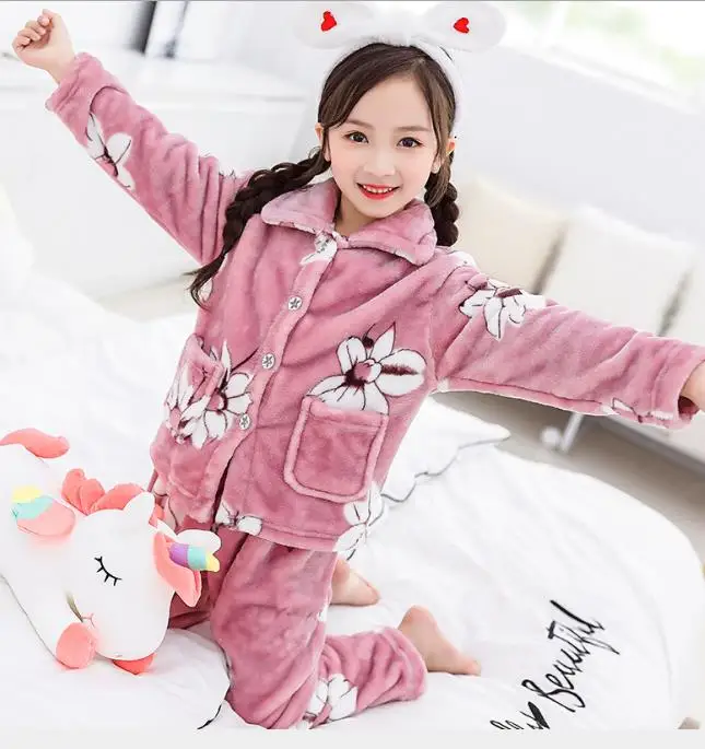 New Children's fashion flannel pyjamas thickened two peice suit for boys and girls