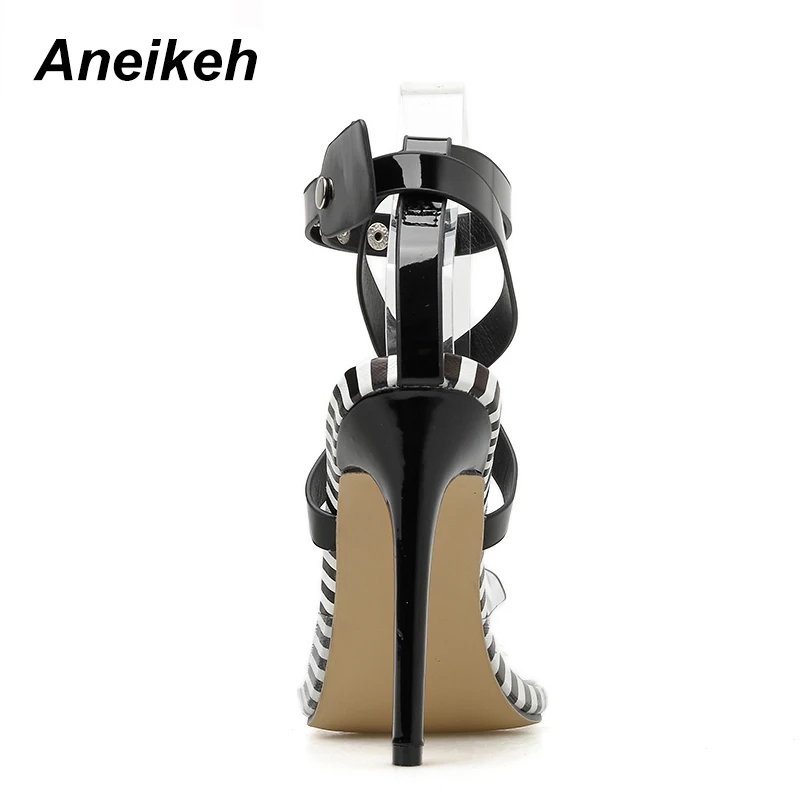 Aneikeh; коллекция года; женская обувь из ПВХ; босоножки на высоком каблуке с острым носком; летние модельные туфли для вечеринки и свадьбы; босоножки с пряжкой на лодыжке с перекрестными ремешками