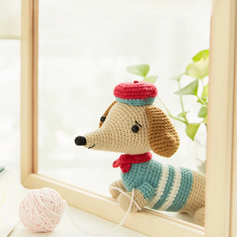 

RUBI hand knitted doll with medium wool, DIY Crochet Crocheted sausage dog doll ,Baby will like it