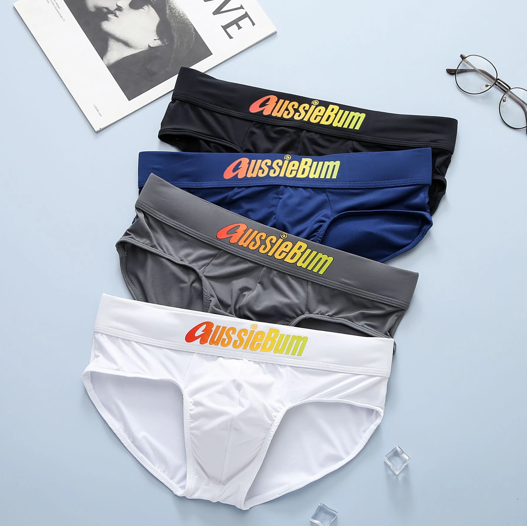 Aussieball-Calzoncillos de seda de leche para hombre, bragas de cintura baja elásticas, cómodas, bolsa convexa en u, palabras coloridas