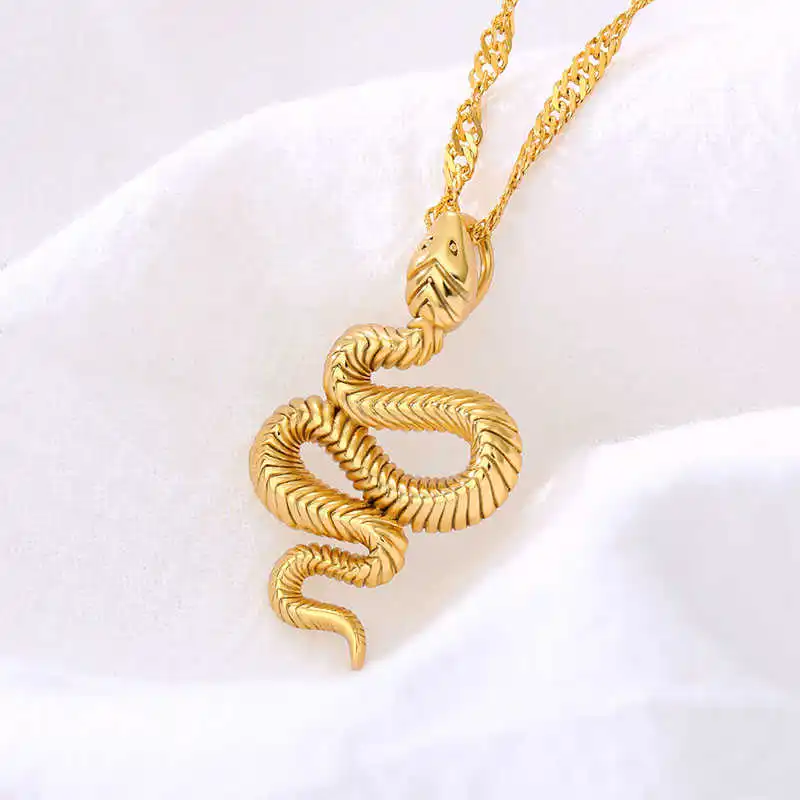 A stylish jewelry piece, the Snake Pendant gold necklace showcases a pendant shaped like a coiled snake. Perfect for women's fashion accessories, it's an elegant addition to any collection.