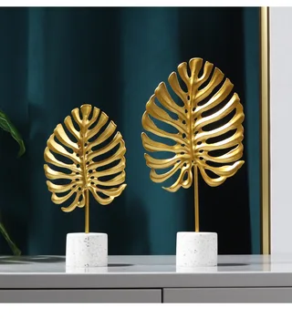 

Golden Monstera leaf Model Iron TV cabinet Decor Leaf With Marble Base Console Cabinet decoration