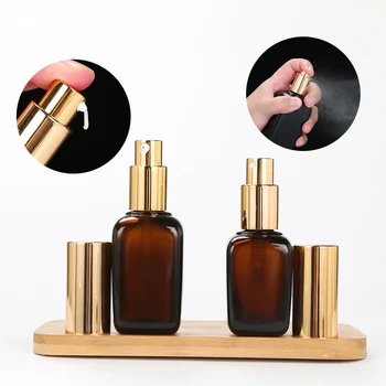 

Glass Lotion Pump Bottle Spray Bottle Amber Square Vial Gold Cap Cosmetic Packaging Container Essential Oil Bottles 10/35/100ML