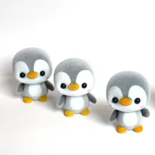 small plastic penguin toys
