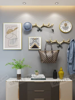 

Modern abstract painting photo wall suitable for home decoration living room bedroom shelf with clock and two resin antlers