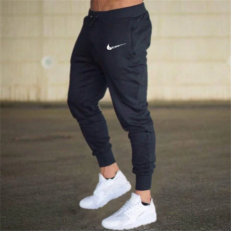 Pantalones deportivos elásticos de talla grande para hombre, pantalón informal para correr y fitness, para primavera y verano, 2021