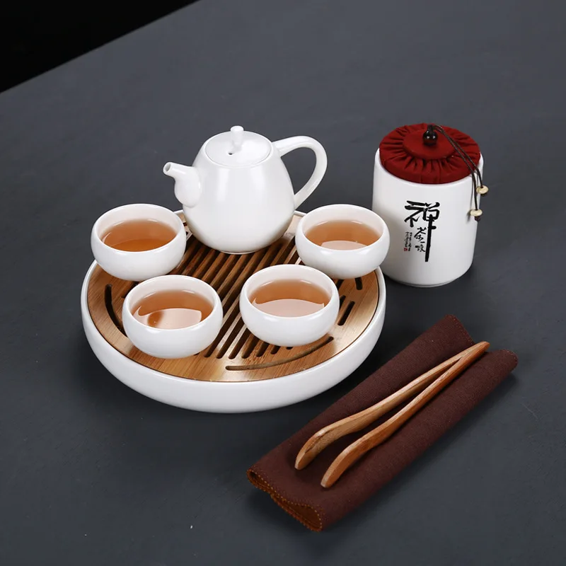 

Fang ran Travel Tea Set Ding a Pot of Four Cup with Tea Tray Portable with Can Be Printed Advertisement Logo Customizable