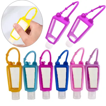 

5Pcs 30ml Silicone Travel Bottles Random Color Silicone Refillable Squeezable Container Hand Sanitizer Bottles Empty Keychain
