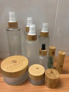 

engraving logo sample 1oz frosted clear glass jar bamboo bottles with lotion spray cap sample skin care cream/cosmetics cream