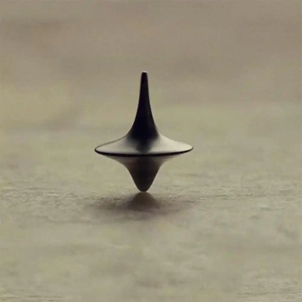 silver spinning top