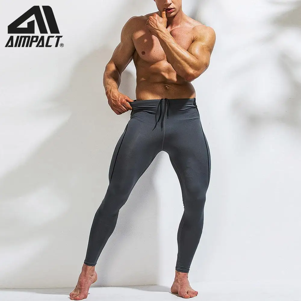 Cena Sportowe spodnie kompresji spodnie męskie sportowe do biegania Fitness obcisłe spodnie i spódnice szkolenia kulturystyka trening siłownia Yogo legginsy szybkie AM5119