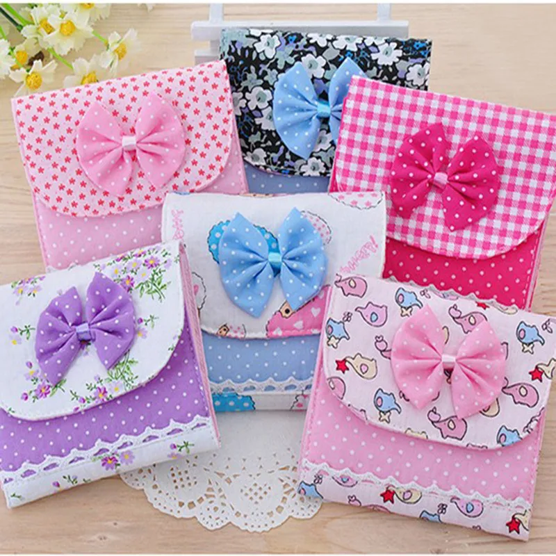 

Hot 1PC Cotton Sanitary Towel Napkin Pad Purse Holder Easy Bag Organizer Random Color Cloth Menstrual Pads Menstrual Bowknot