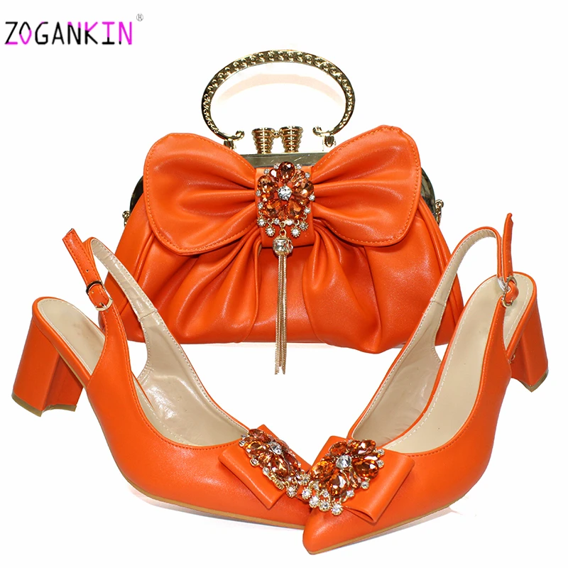 orange heels and bag