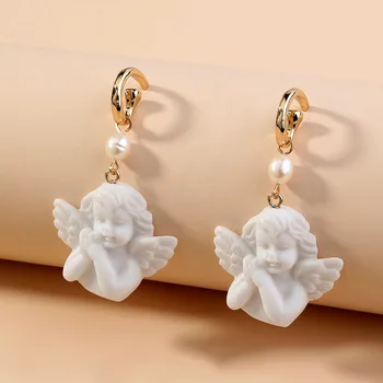 

2020 trend new Exaggerated and cute pure white little angel statue Women's earrings Cupid earrings temperament fashion jewelry