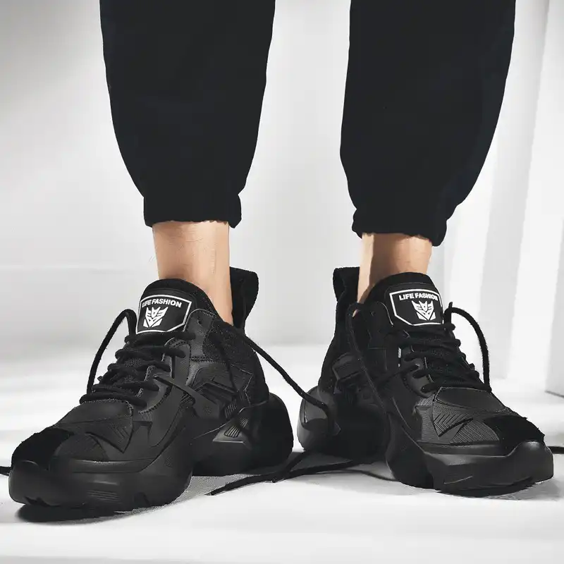 boys all black trainers