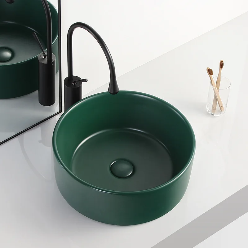 

Table basin Nordic creative matte ink green hotel ceramic washbasin round home bathroom light luxury table basin