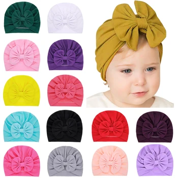 

Bebe Girl Bonnet Solid Bow Warm Hat for Newborn Baby Headgear Infant Bebe Soft Cotten Cap Tire Kids Hedging Hats Big Bows Turban