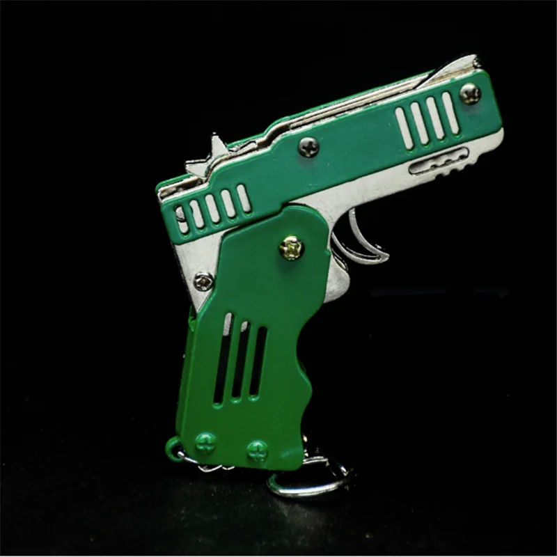 6-Schuss mit Schlüsselbund Gummiband 100 Gummibandpistole Folding Metal V5T9 