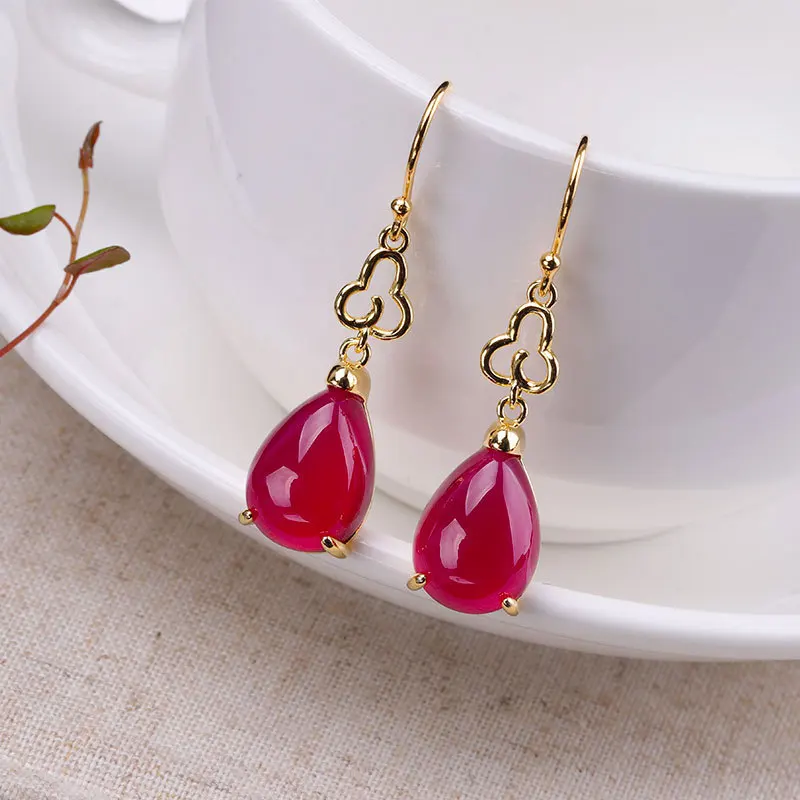 

Character silver S925 pure silver jewelry earrings fashion women's gold-plated water drop red corundum Earrings NEW