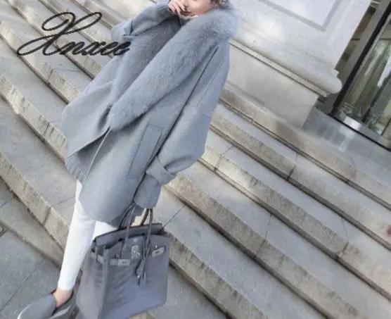 

2019 autumn and winter new Korean version of the popular woolen coat female large fur collar long loose loose woolen coat