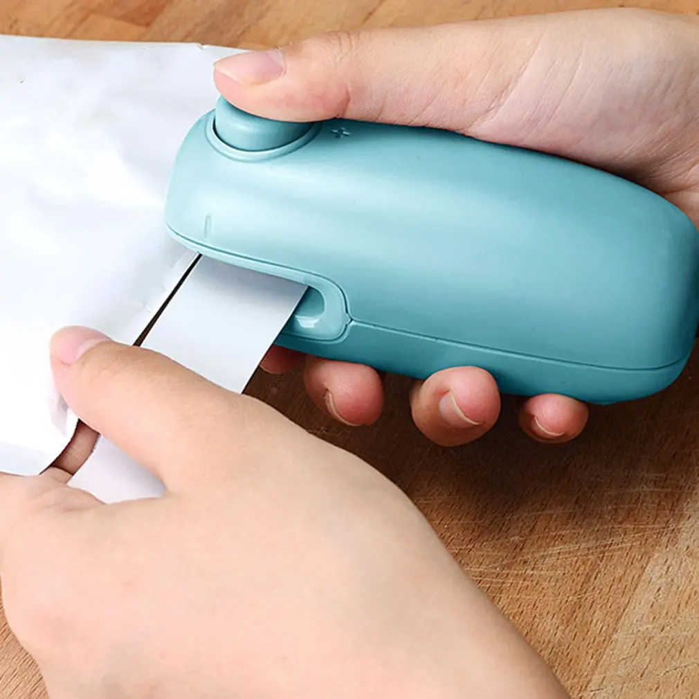

Portable Heating Sealing Machine Portable Mini Miniature Hand-Pressing Food Packaging Bag Sealing Machine Heating