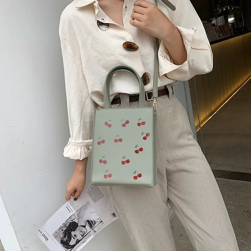 

Summer cherry embroidered Western style bag women's bag new tide 2019 Korean shoulder slung Tote bag