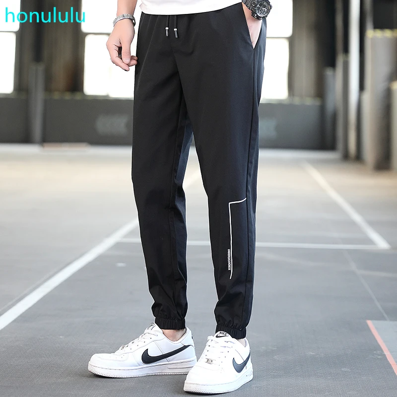 

Pants men's loose foot binding Korean Trend sports casual pants summer thin nine point fit work pants trend brand