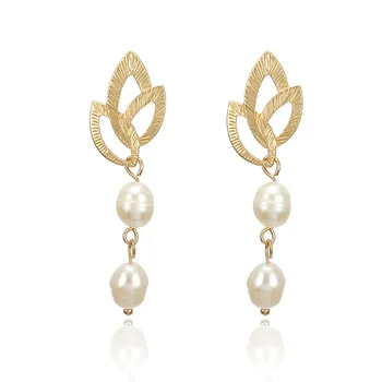 

is tasted in Europe and the strong personality contracted pearl pendant fashionable flower metal stud earrings earrings