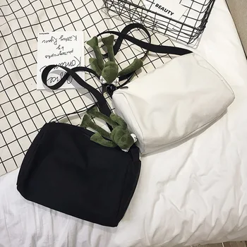 

Korean ins wind dark black solid color canvas bag Japanese Harajuku simple wild student crossbody bag female