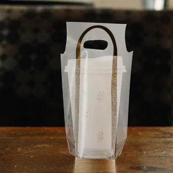 

50pcs Tea Milk Takeaway Handbags PE Transparent Coffee Drinks Disposable Takeout Bags Carry Bags (Single Cup - Golden Edge)