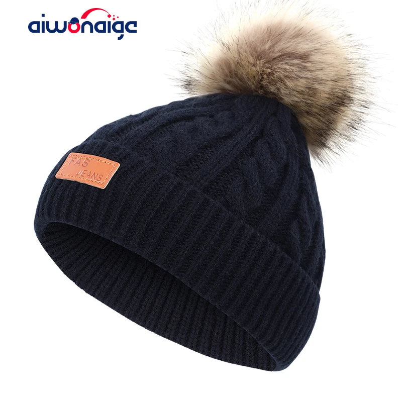 

2019 new children's solid color winter hat boys and girls pompoms letter knit hat fun cotton hat cute baby winter warm hat