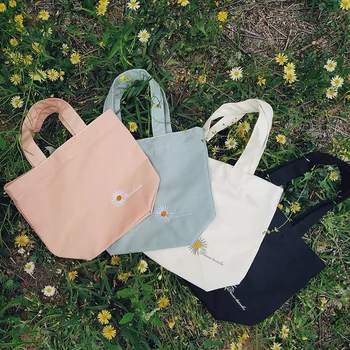 

Japanese candy-colored canvas bag small daisy embroidery portable carrying lunch box bag to work lunch bag
