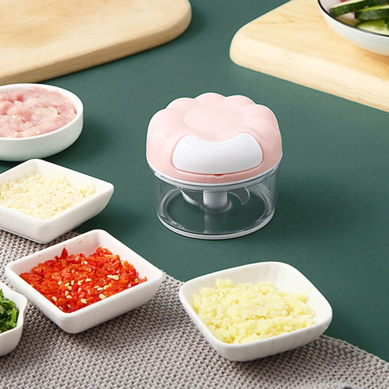 https://ae01.alicdn.com/kf/H4bac5761db0444ae82d4360f6093e4cbT/Portable-Vegetable-and-Food-Cutter-Manual-Garlic-Puller-Fruit-Chopper-Multi-function-Meat-Grinder-Vegetable-Cutter.jpg