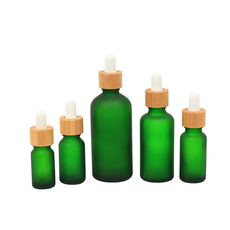 

10ml 20ml 30ml 50ml Frosted Green Glass Makeup Emulsion Lotion Packing Bottle Bamboo Lid Beauty Remover Toner Liquid Containers