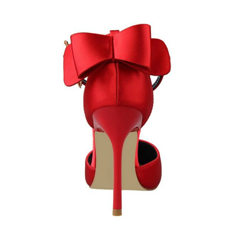 red heels with bow on back