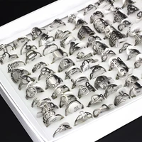 50Pcs/lot Mix Random Style Laser Cut Pattern Golden Color Stainless Steel Rings Women Party Ring 2