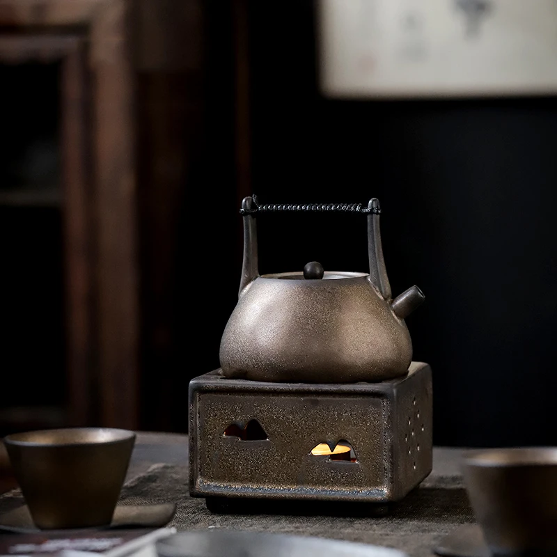 https://ae01.alicdn.com/kf/H4bf0874d229b4d5aa9fb021a92e3790dF/Vintage-Tea-Stove-Ceramic-Pottery-Warmer-Japanese-Teaware-Accessories-Teapot-Base-Holder-Candle-Heater-Thermostat-Crafts.jpg