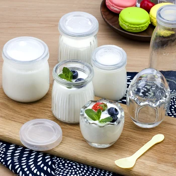 

A pack of 4 pudding glass bottles with lid.Eggshell shape Party bakery tools Mousse cake bottling Jelly mold Yogurt cup Shaped