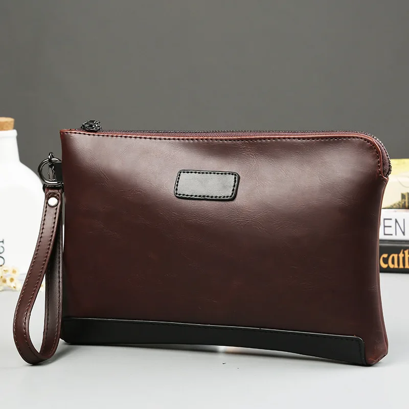 

New men's hand bag, Korean mad horse leather business envelope hand grip bag