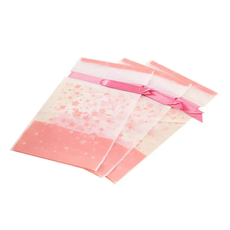 20PCS Пластиковые плоские виолончели обрабатывать сумки розовый Упаковка для конфет цветущая вишня пищевые Сумки на шнурке с лентами - Цвет: 20PCS