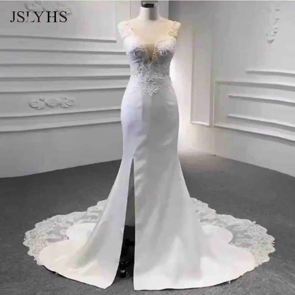 

High quality luxury fabric mermaid wedding dress new skin tone net high-end lace diamond tail pearl decoration bridal gown