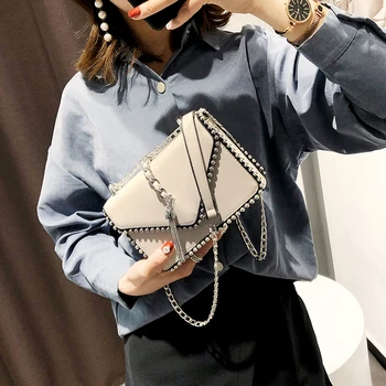 

British Fashion Simple Small Square bag Women's Designer Handbag 2020 High-quality PU leather Rivet Tassel Chain Shoulder bags