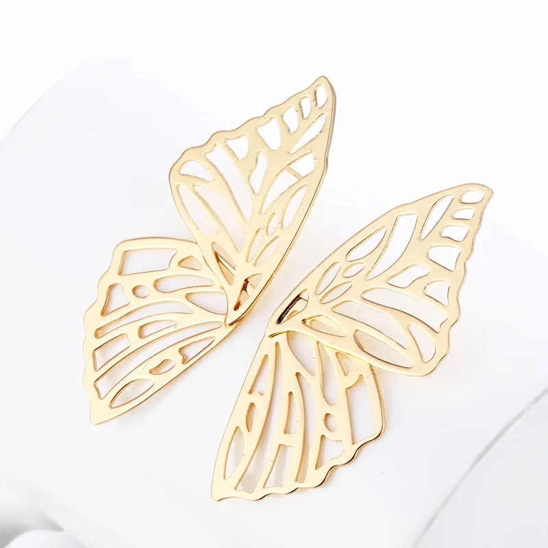 Элегантные серьги в виде бабочек для Для женщин браслеты с подвесками золотой цвет. Полый металла серьги-гвоздики в виде крыльев модные ювелирные изделия в стиле "Бохо"