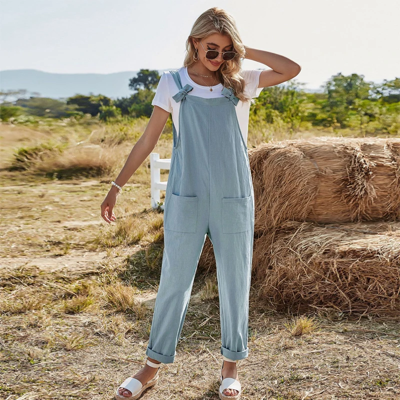 

2021 Spring New Spaghetti Strap Jumpsuit Women Casual Bow Overalls Female Solid Color Loose Pockets Long Trousers Jumpsuit