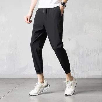 

Spring New Men's Joggers Pants Streetwear Hip Hop Male Trousers Casual Harem Pants Male Loose Soft Plain Leg Opening Clothes