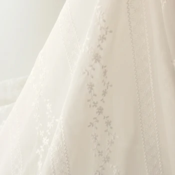 

Cream white fine embroidery jacquard wall chiffon fabric garment ins wind door curtain fabric