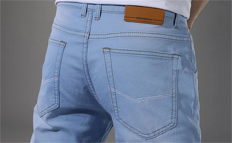 Мужские облегающие джинсы, Мужские Стрейчевые Модные узкие джинсы брюки, мужские эластичные повседневные Прямые голубые джинсы со средней талией, WG208