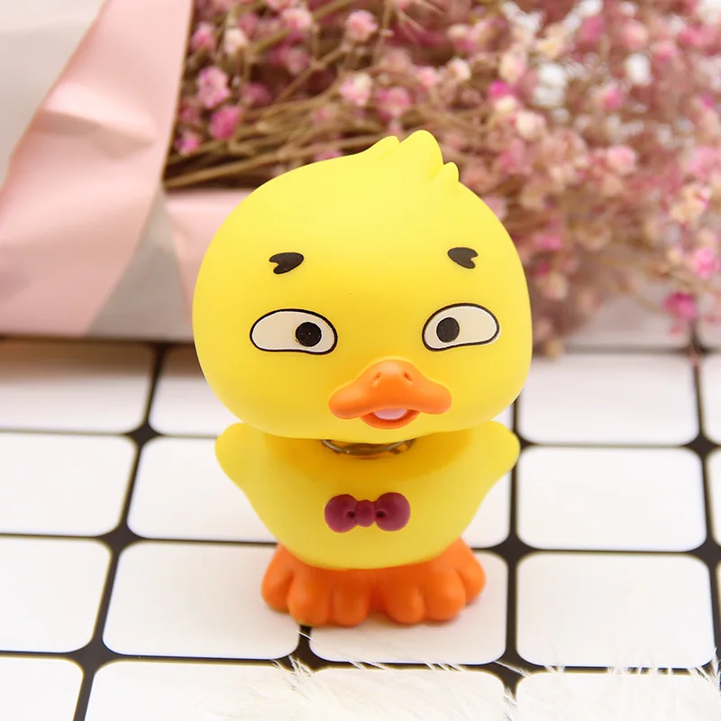 

Hot Selling Shaking Head Little Yellow Duck Children Vinyl Doll Cartoon Cute Decompression Toy Children Toy Christmas Gift
