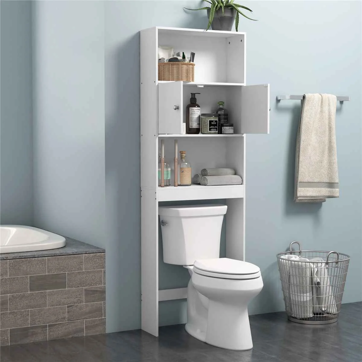 over the toilet bathroom cabinet has a double door storage cupboard.
